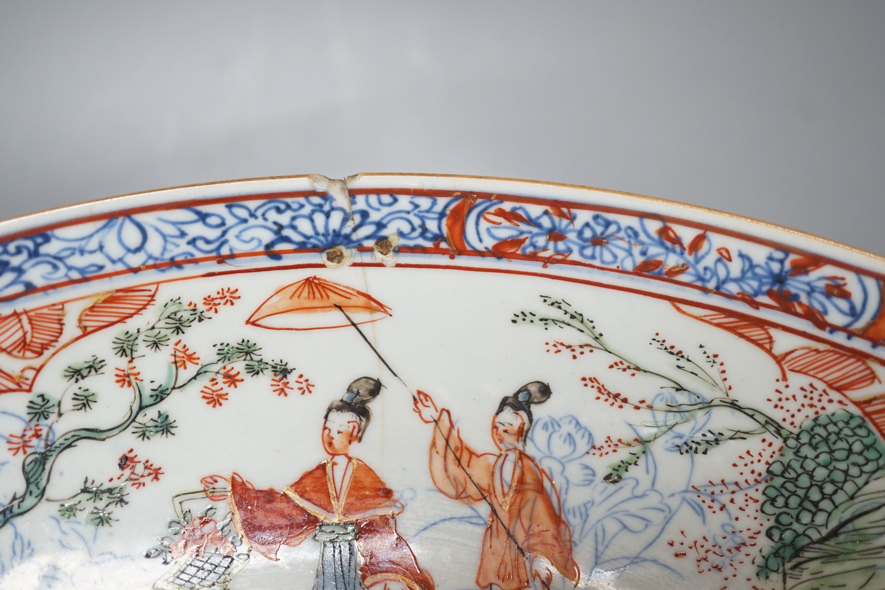 A large Chinese Kangxi dish, clobbered decoration, 37cms diameter.